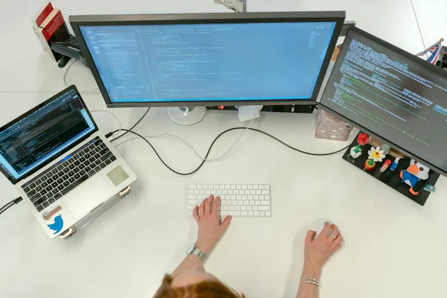 Workstation with monitors showing code